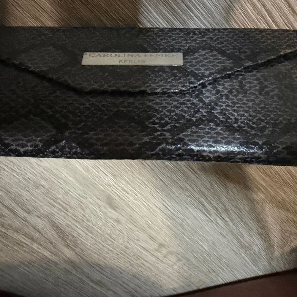 Carolina Lemke Berlin Black Snakeskin Sunglasses case